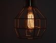 Photo industrial wire cage ceiling lamp